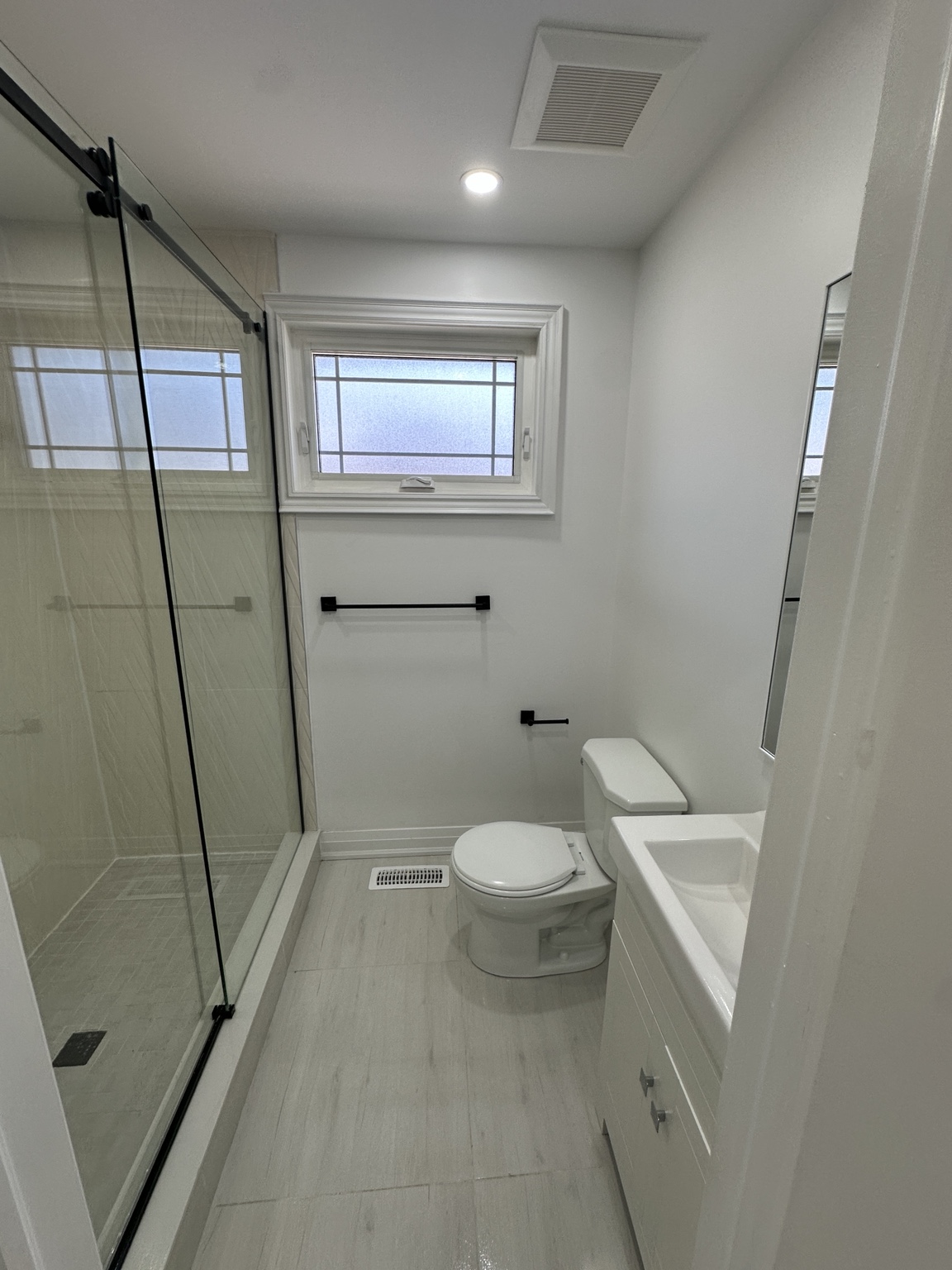 Clean bathroom vanity and mirror